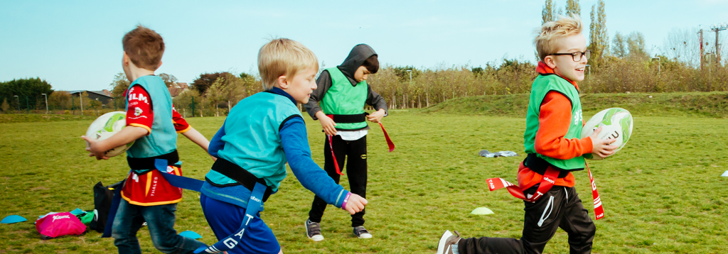 9 Sports to Try to Help Kids Stay Active Throughout the Year 4 tag rugby chase