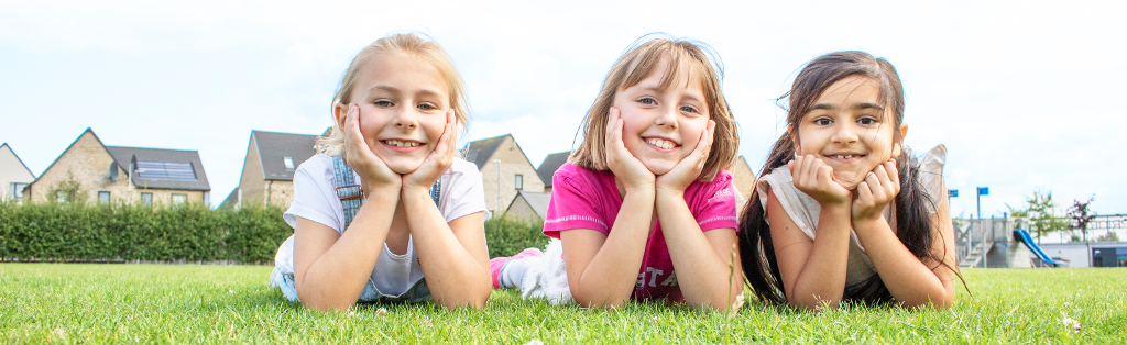 Improve Pupils' Wellbeing With Physical Activity 1 Wellbeing girls smiling 1024x314 1