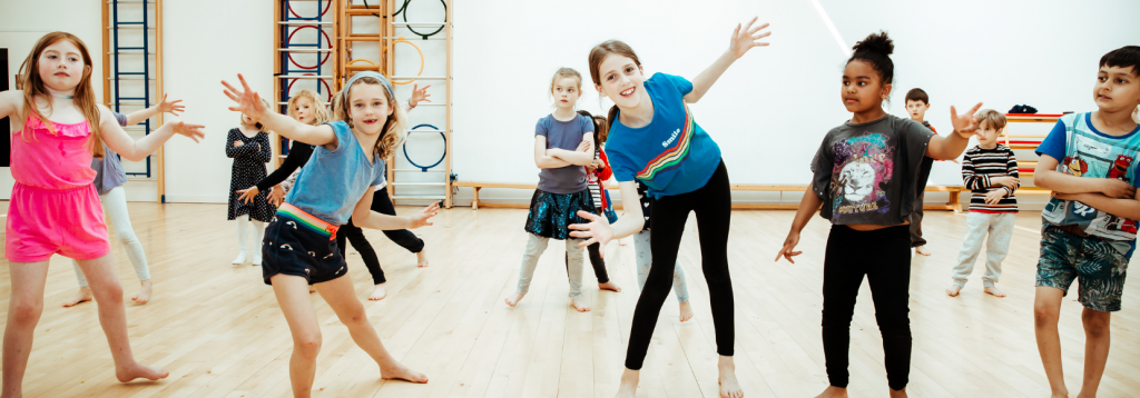 Holiday Camp FAQs 3 Children dancing at a Premier Education Holiday Camp 1