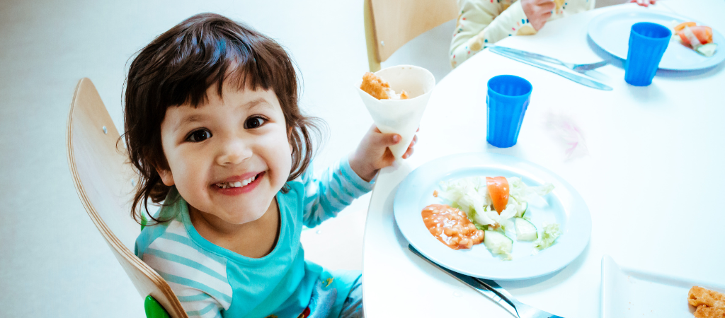 How to Get Your Child to Eat Vegetables 2 Child enjoying lunch