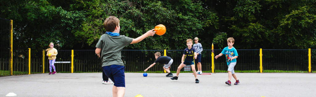 11 Summer Holiday Activities for Kids to Get Active 5 Children playing dodgeball