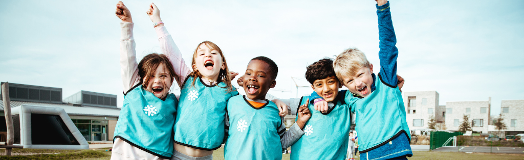 5 Ways to Encourage Emotional Wellbeing for Children 2 Children cheering at a Premier Education course
