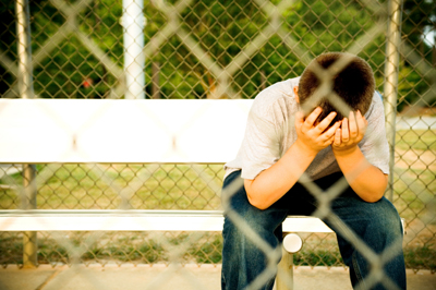 Why Kids Quit Sports and How to Prevent it 2 Child with head in hands