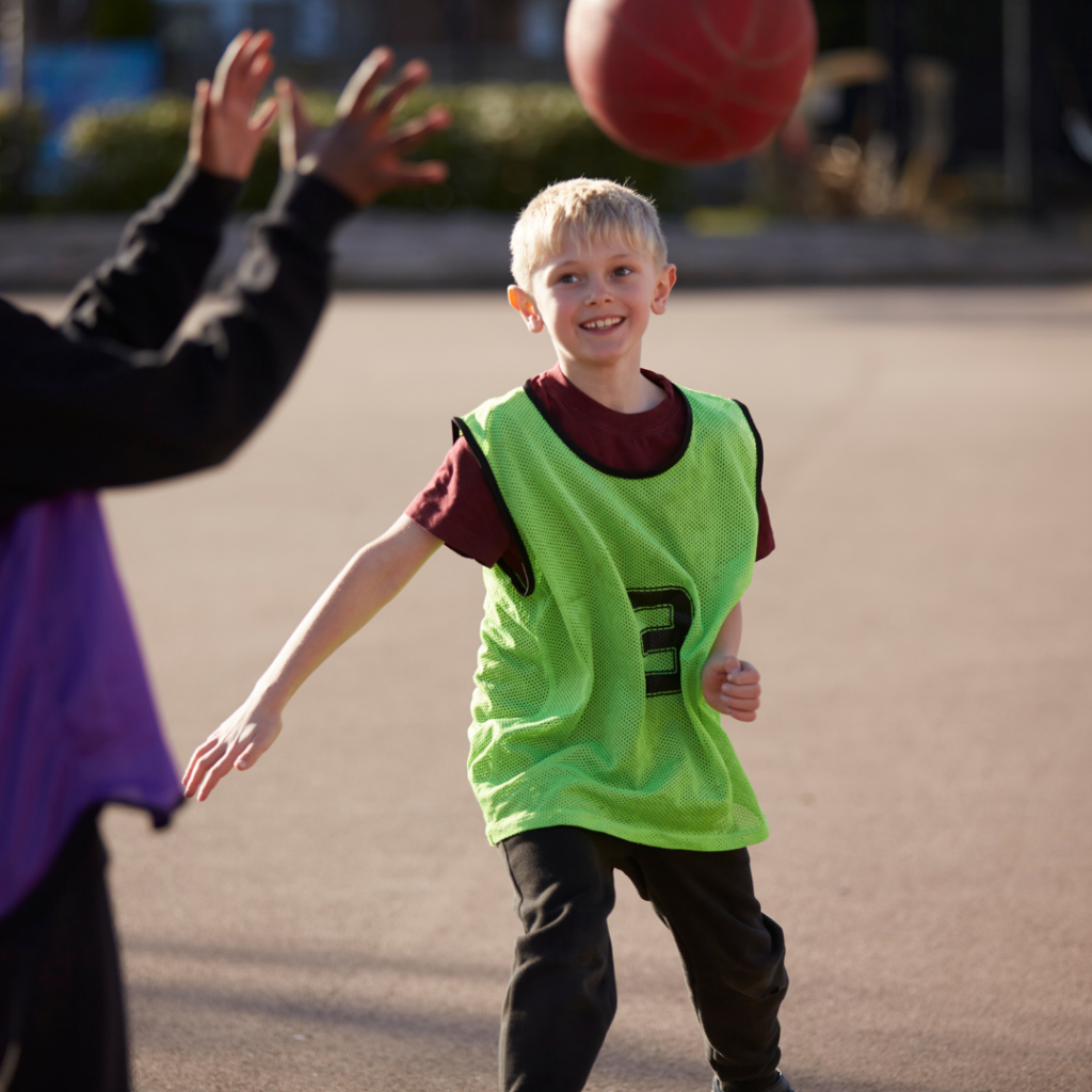 How to Get Your Pupils Involved In National Schools Sports Week 1 boy enjoying Premier Education basketball