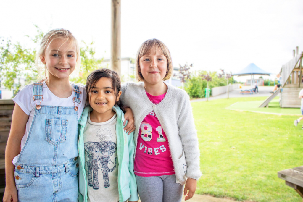 5 games to make walking with children more fun 1 3 pupils smiling at a Premier Education Holiday Camp