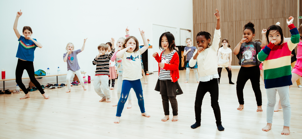 Is Dance a Sport? The Benefits for Kids 1 Children dancing during a Premier Education extracurricular club