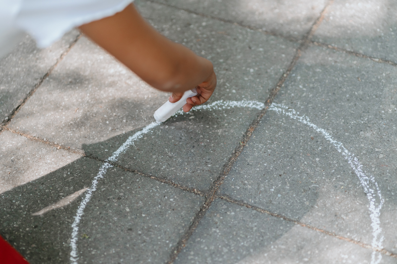 8 Tennis Games for Kids 1 kids drawing circles with chalk
