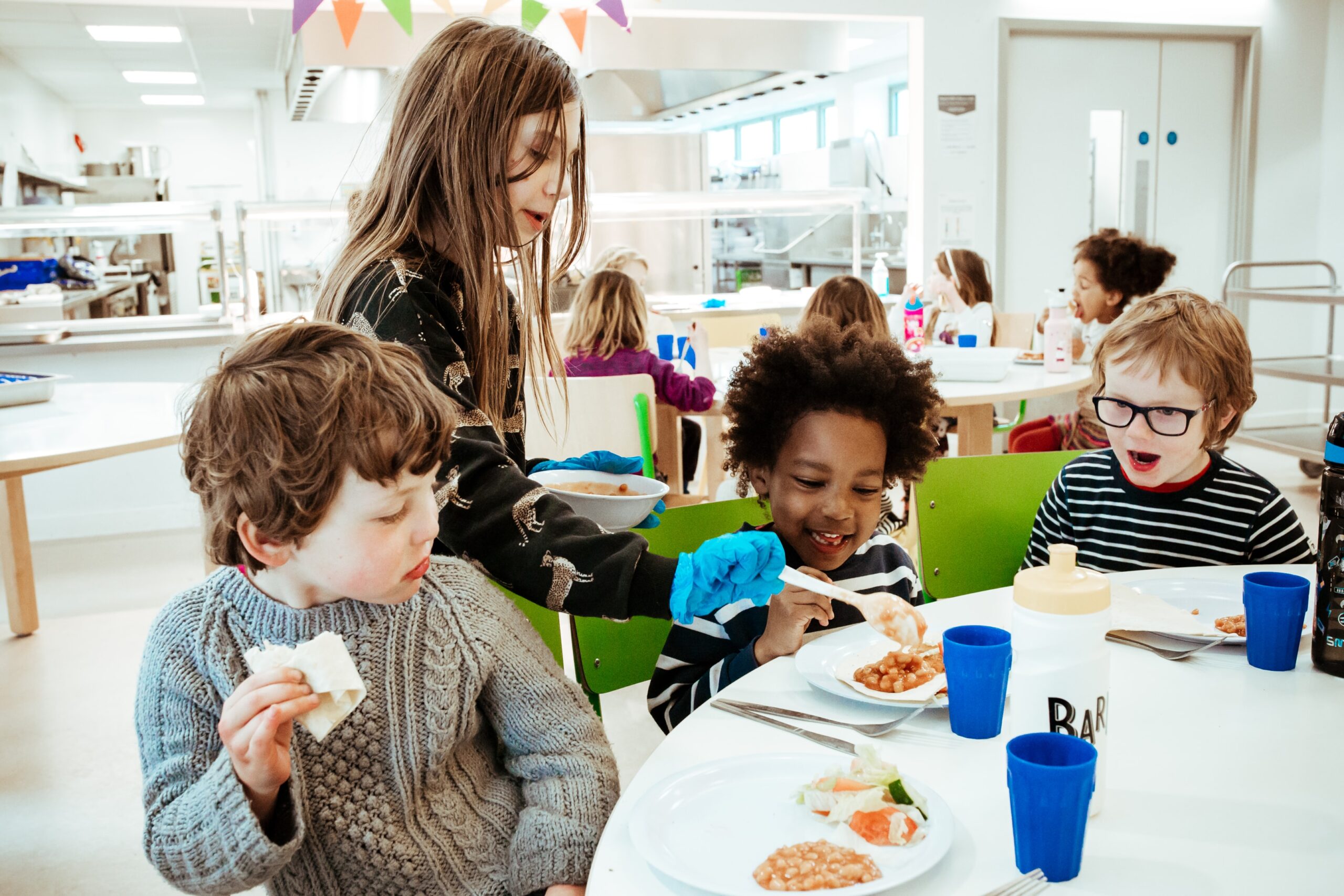 What is playwork and why is it growing? 5 Children enjoying school food