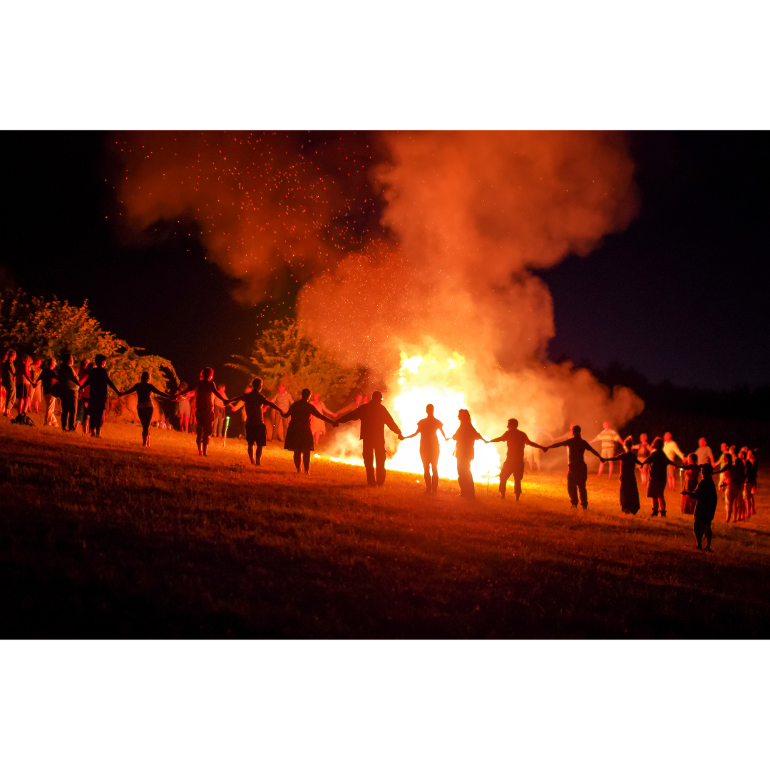 people gathered around a fire