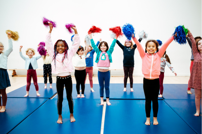 Movement and Mood: Why Active Kids Thrive 1 children enjoying holiday club dance activities